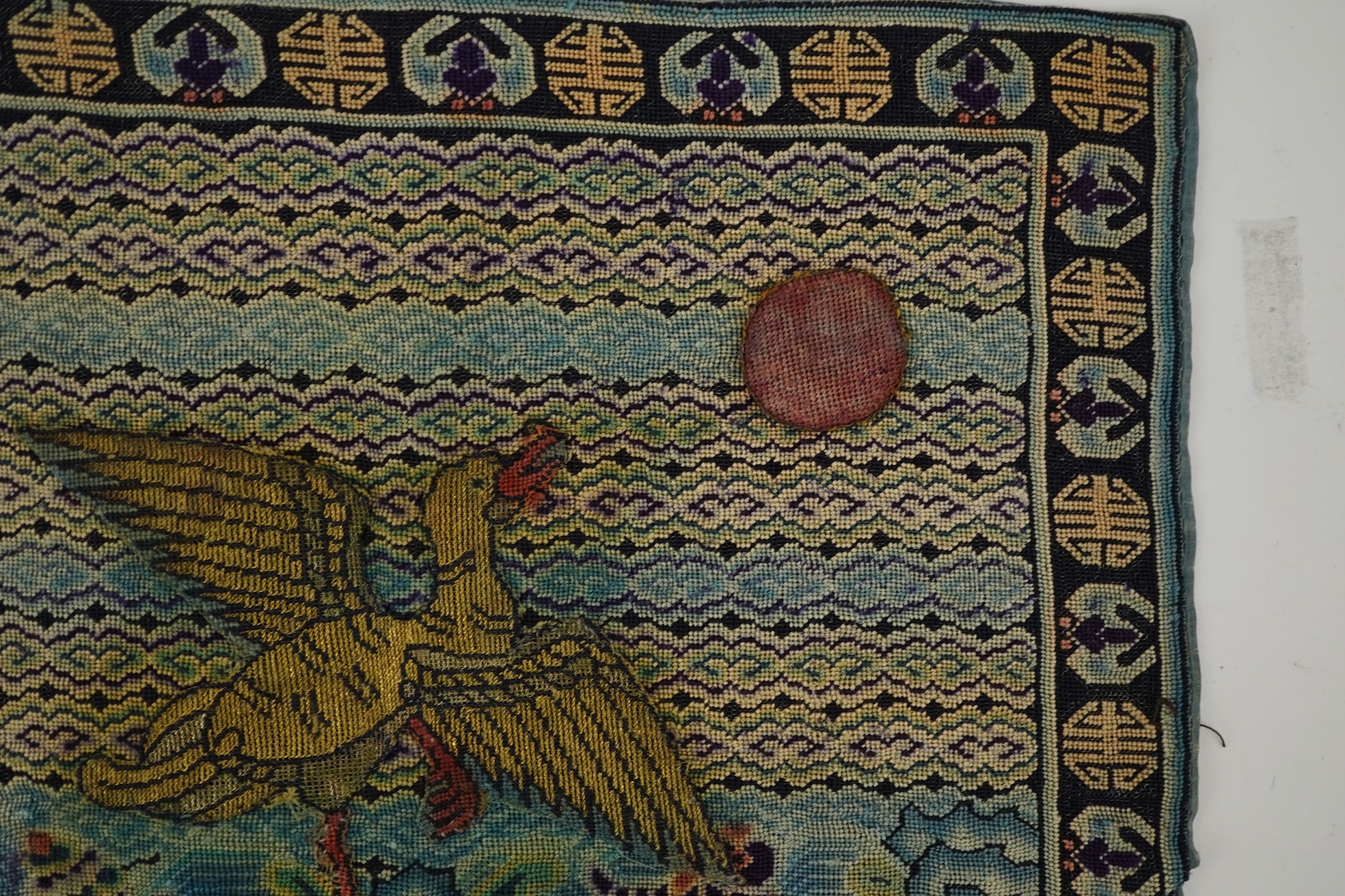 A Chinese needlepoint rank badge, 19th century